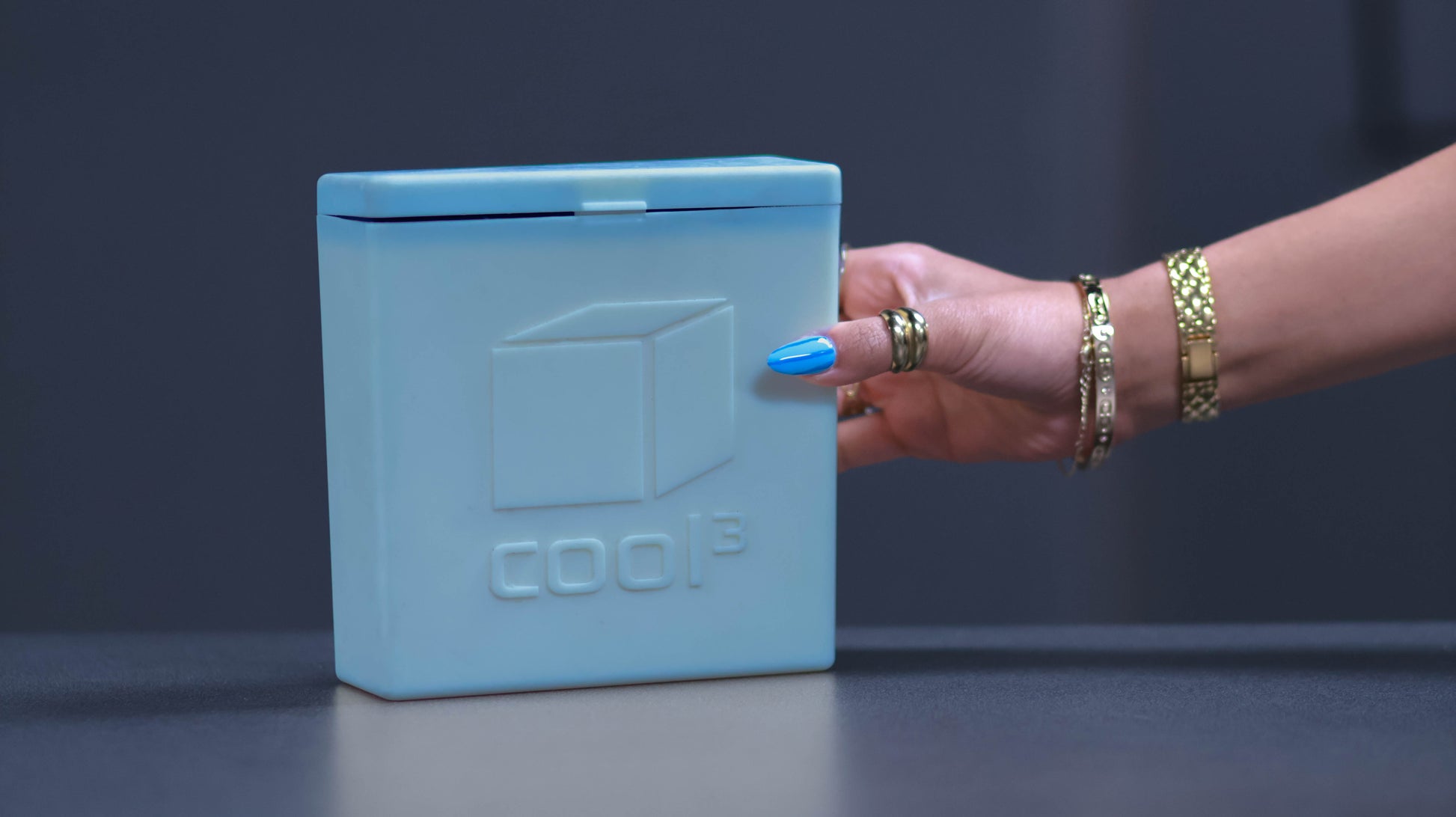 Hand holding Cool 3 ice pack